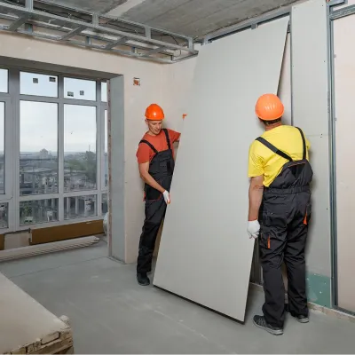 workers-are-mounting-plasterboard-wall 1